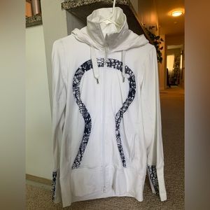 Lululemon white hooded zip up. Size 6 gently worn.